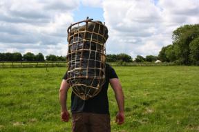 All loaded up and taking it out for a spin. The high position is better for load carrying but a bit unstable with just the tumpline fitted. More traditional models are shaped more like a cone which seems to dovetail better with the tumpline strap and aid stability