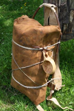 Loaded up with belongings wrapped in a heavily smoked red deer hide